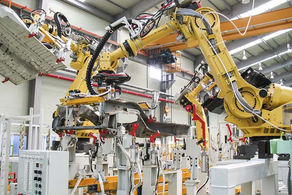 применение промышленных роботов в мире
